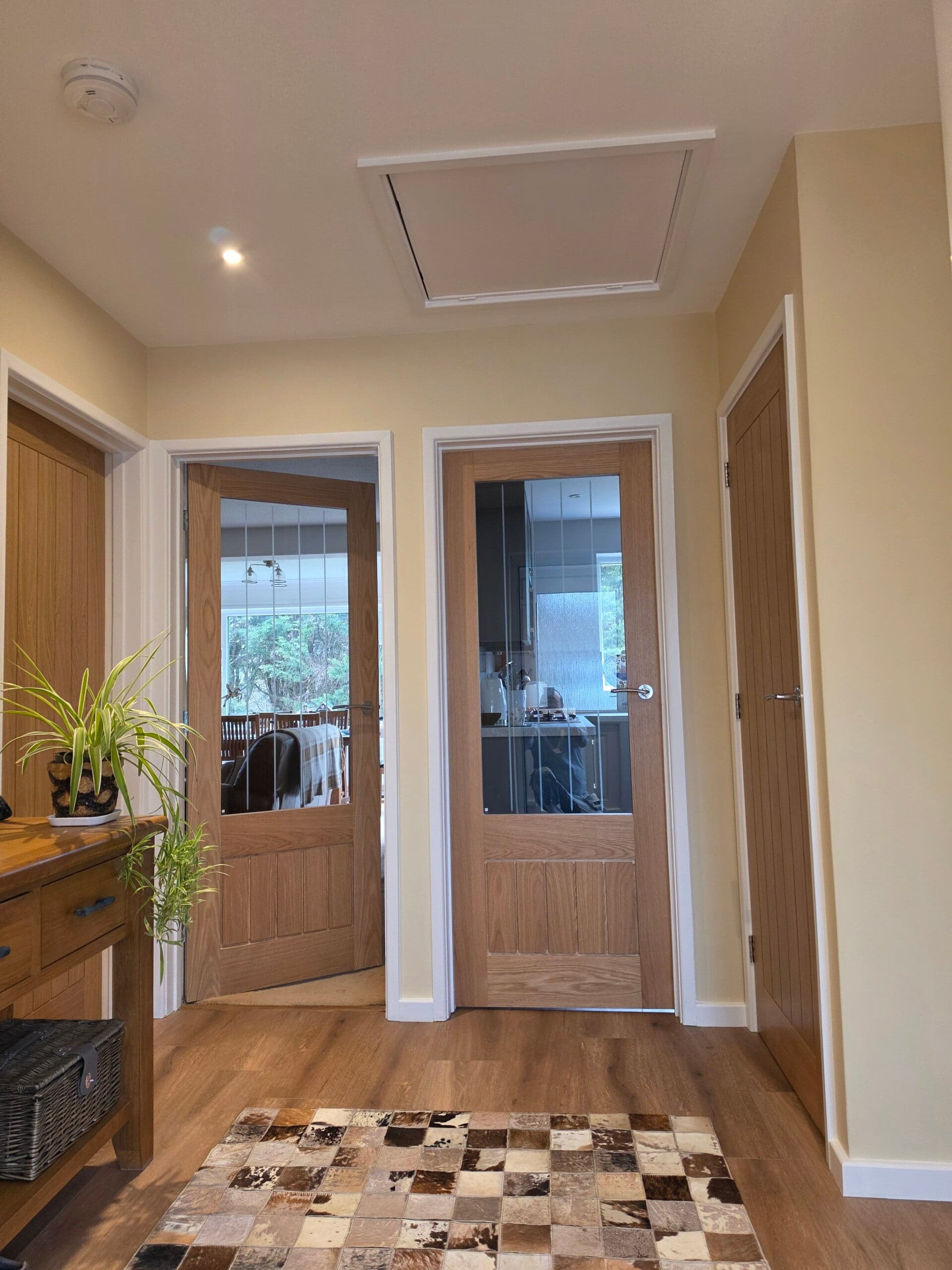 Newly decorated hallway and staircase with crisp paintwork